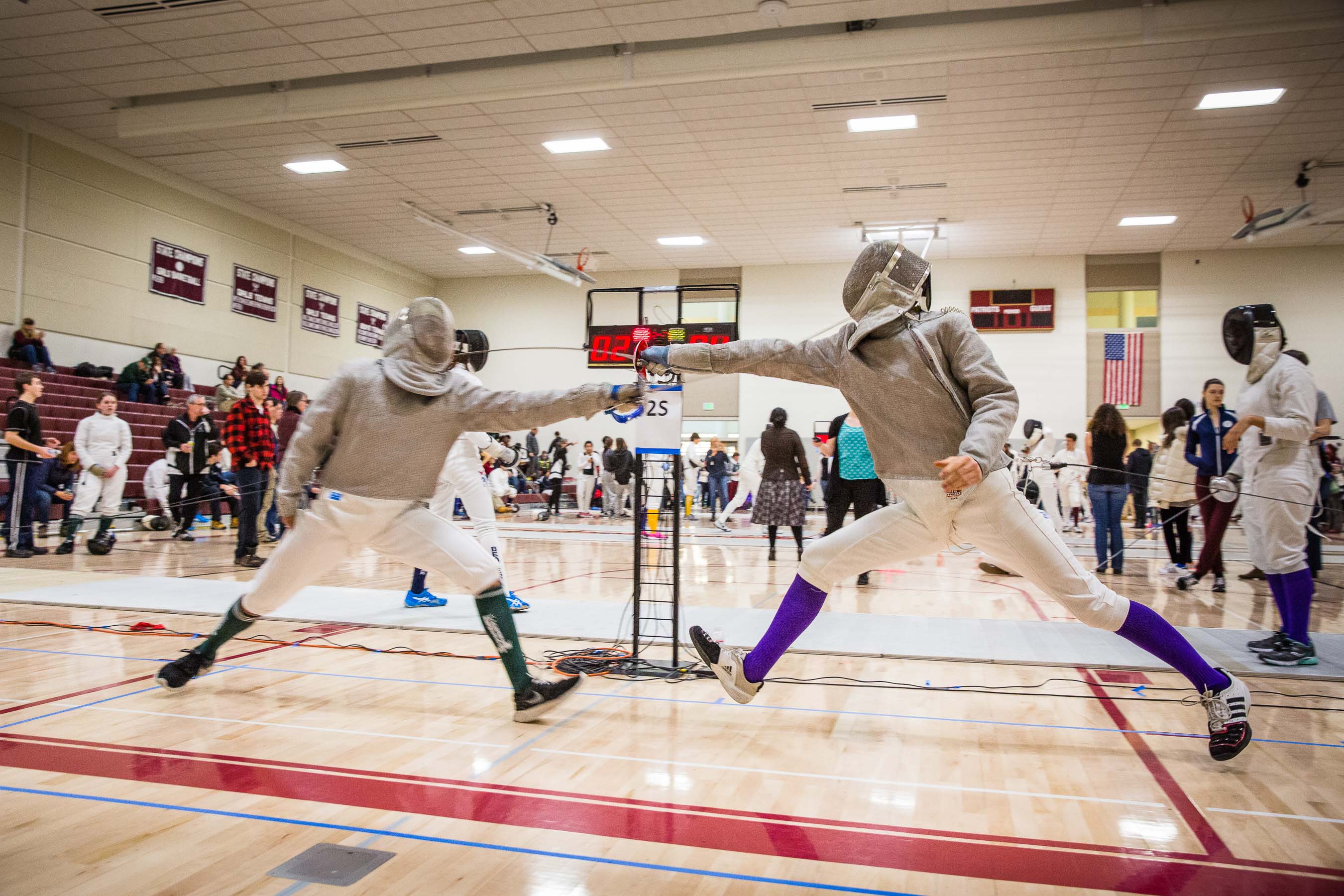 High school sabre fencers 