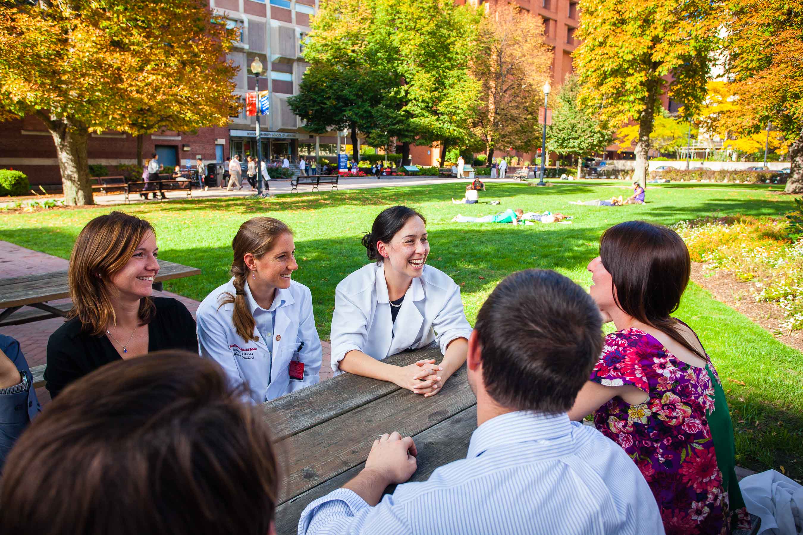 Medical school students having a discussion outside