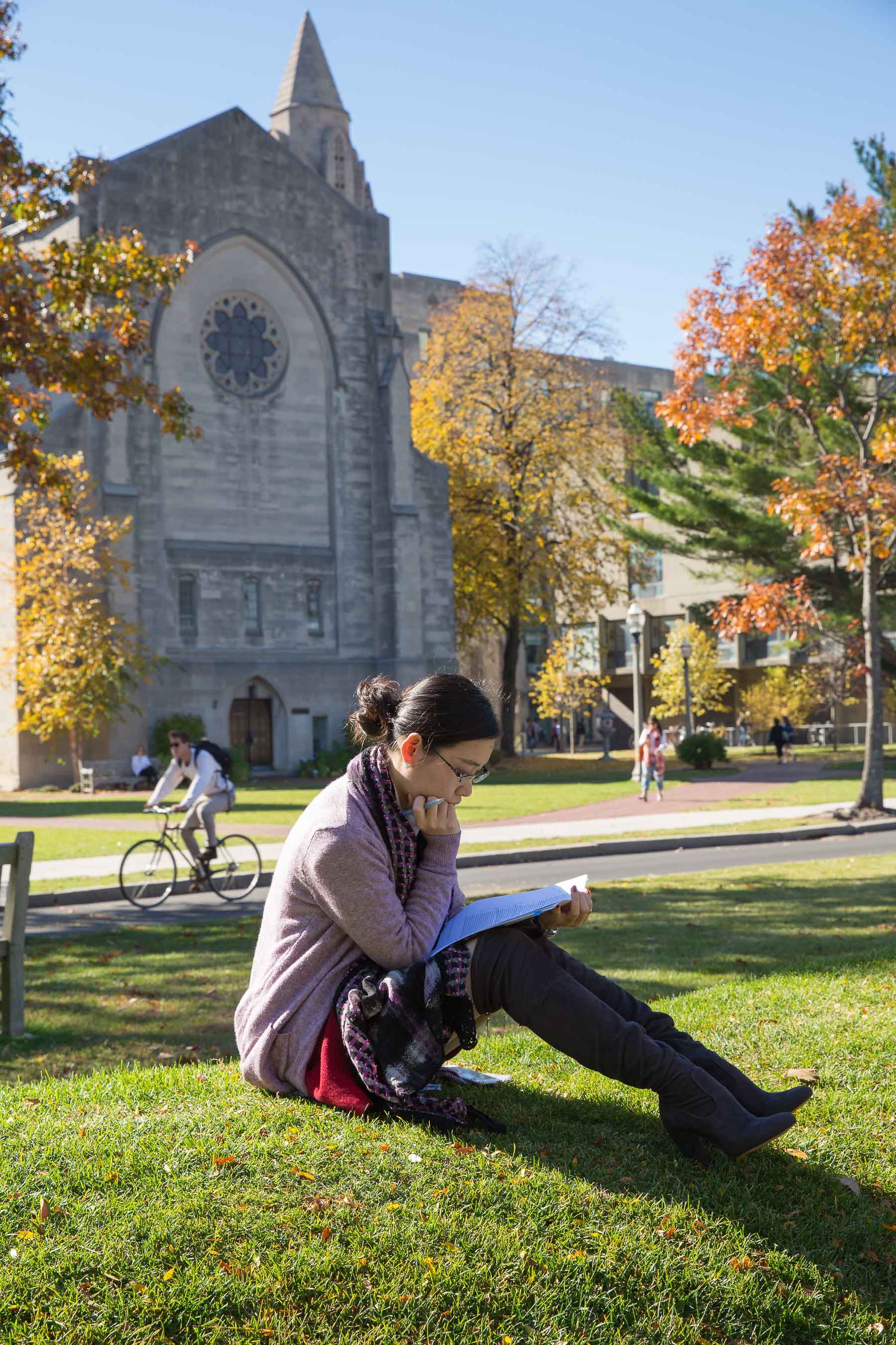 Student studying on BU beach